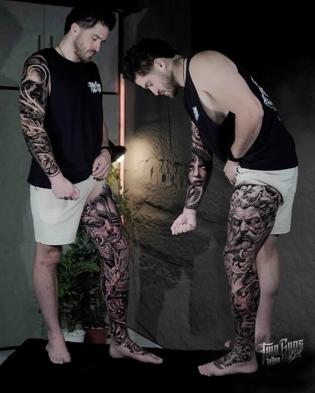 Black and grey leg sleeve tattoos shown on two clients