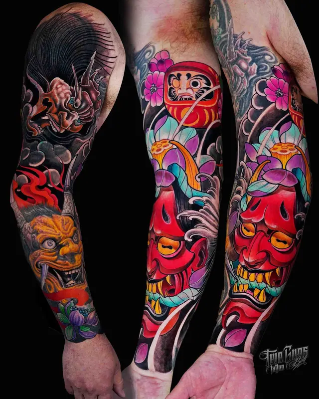 Colour Japanese leg sleeve tattoo of red daruma and oni masks with flowers, three angles