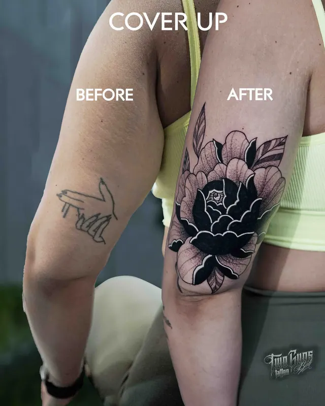 Cover-up tattoo before and after: small old arm tattoos covered with a large black and grey peony