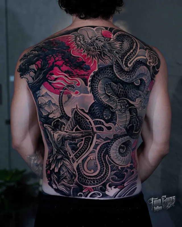 Black and grey Japanese full back tattoo of a dragon and archer with red cloud