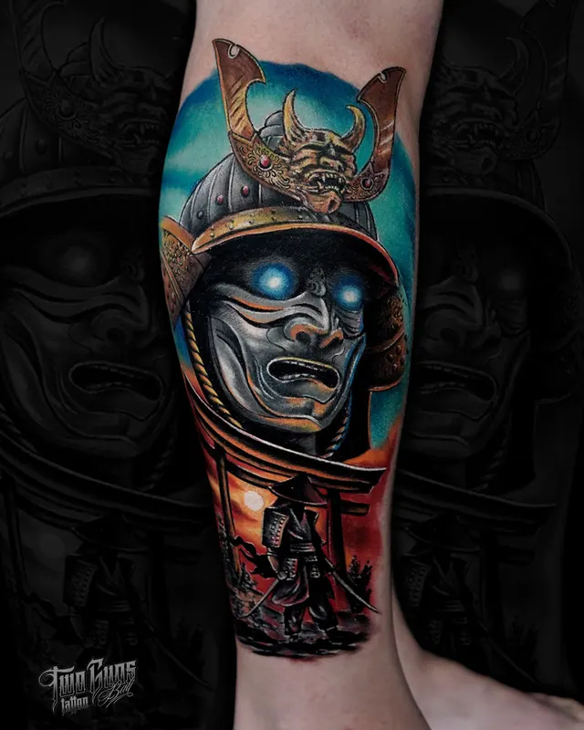 Colour Japanese lower leg tattoo of a samurai helmet and mask over a red battle scene