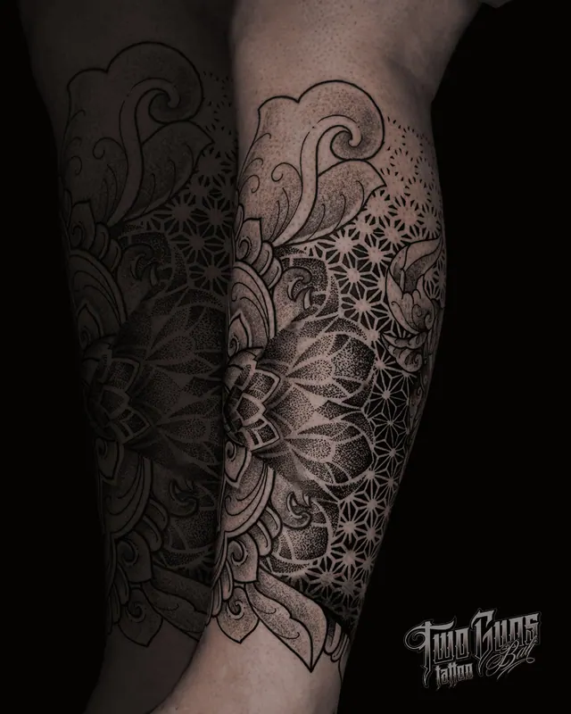 Fine line mandala and floral tattoo down the lower leg