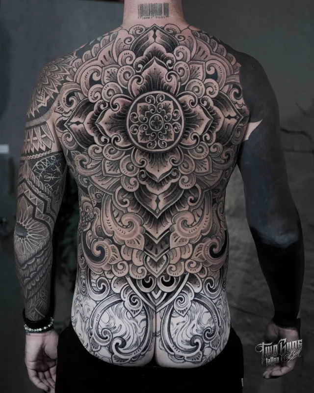 Ornamental mandala dotwork full back tattoo
