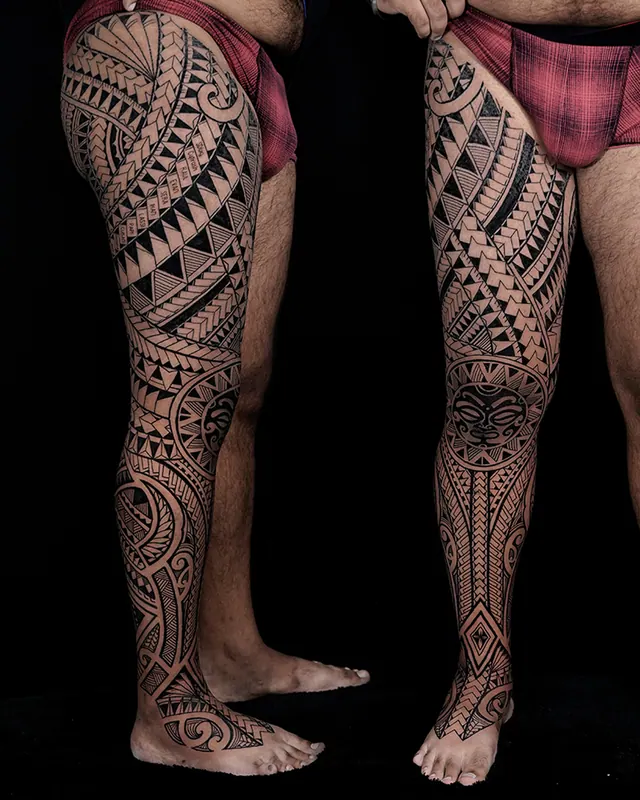 Polynesian thigh and calf tattoos shown from two angles