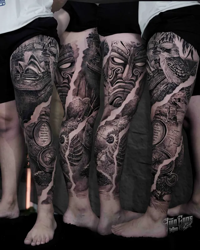 Black and grey realism leg sleeve tattoo of carved faces and a bird with a torn skin effect