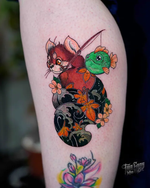 Colour Japanese style thigh tattoo of a cat with a mask and koi