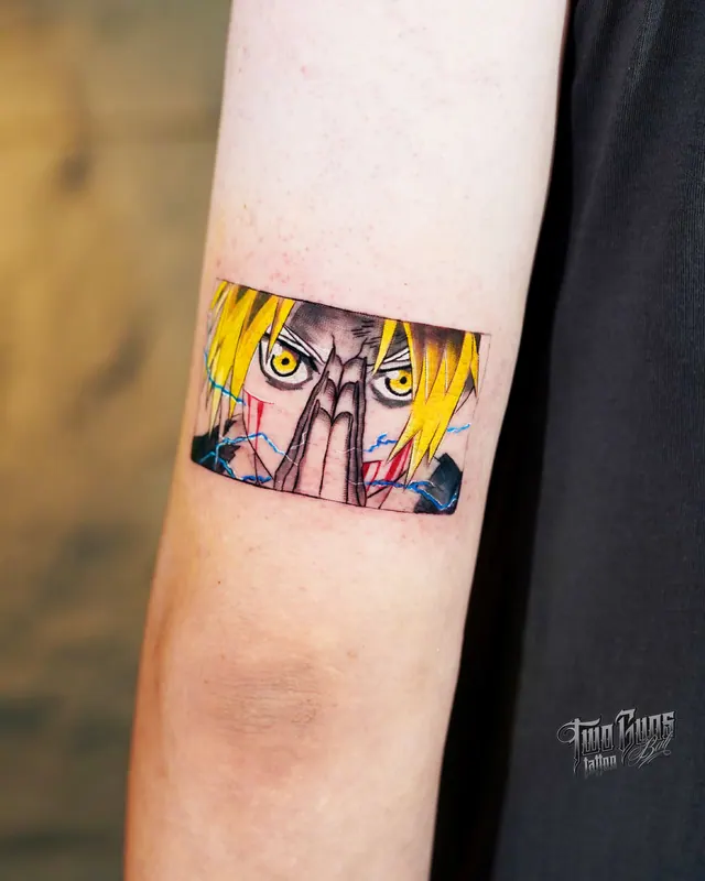 Small colour anime panel tattoo on the forearm